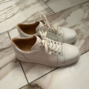 Louboutin sneakers worn once with box and papers